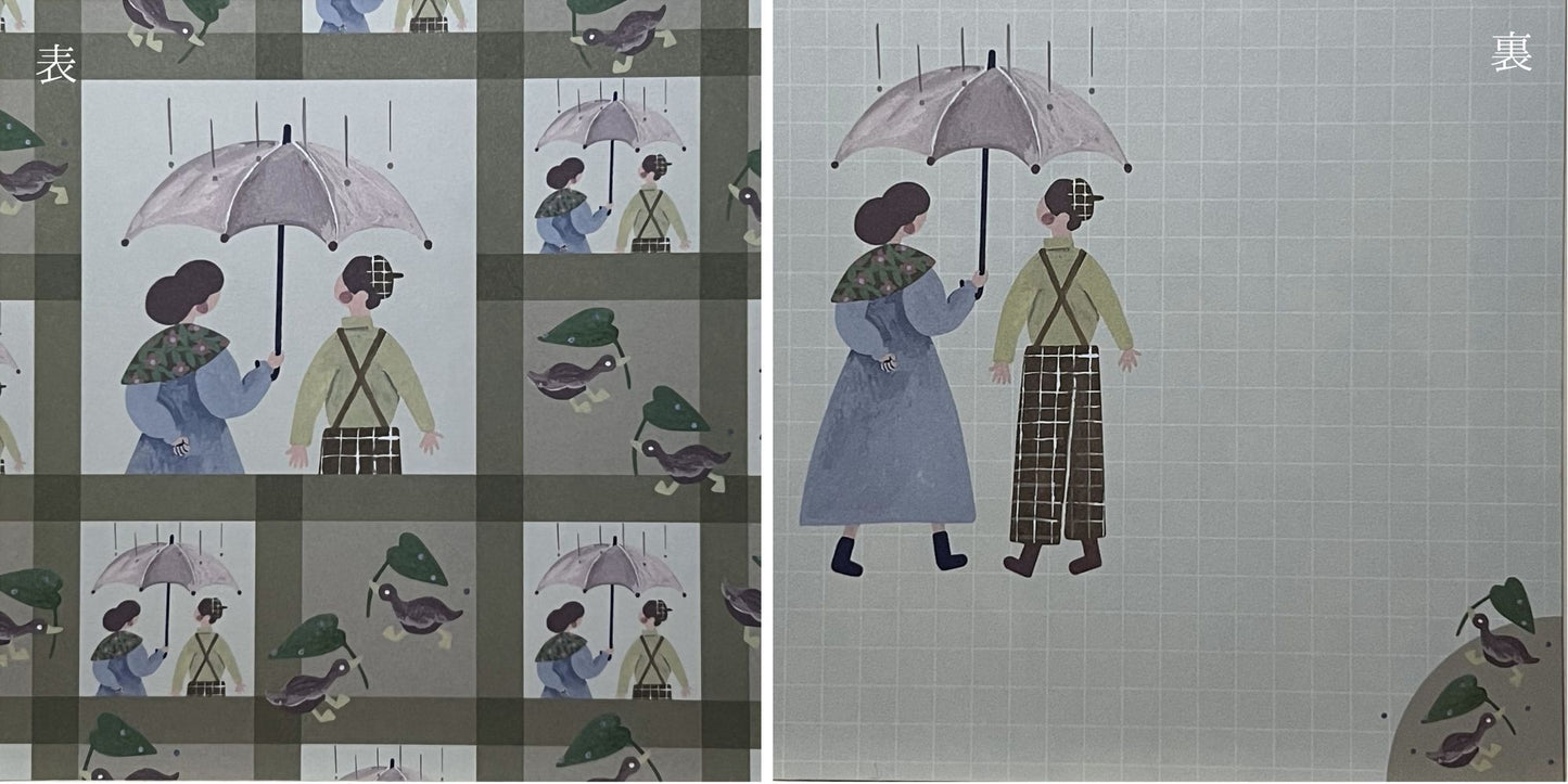 傘をさす男女が並ぶ、落ち着いた配色のましかくメモ / Square memo featuring a boy and girl standing under an umbrella in muted colors