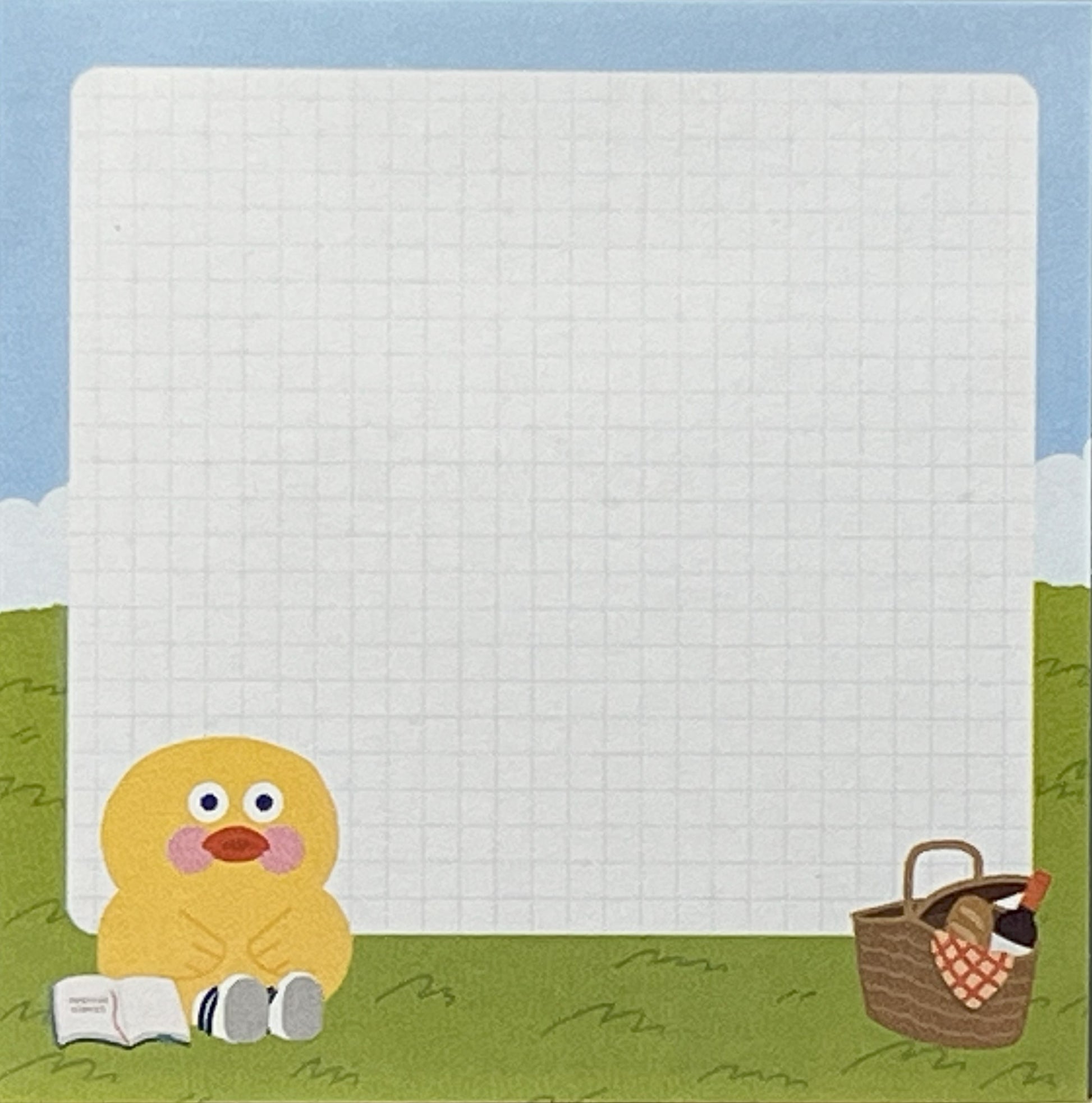 本を読むダックとピクニックバスケットが描かれた、方眼入りの正方形付箋。
A square sticky note with a grid design featuring Duck reading beside a picnic basket.