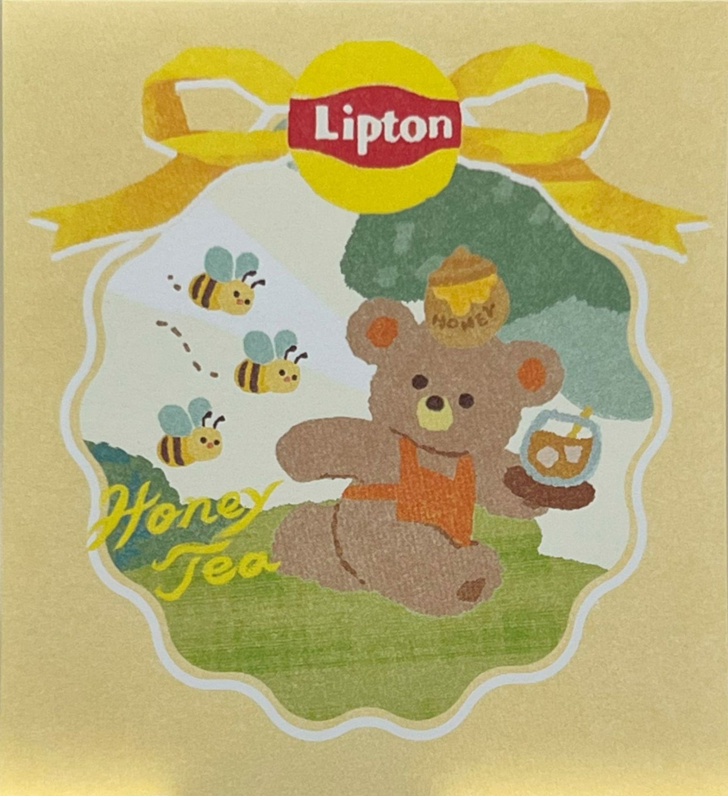 ハニーティーを楽しむくまのメモパッド（リプトン紅茶、はちみつ、ミツバチのイラスト）
Memo pad featuring a bear enjoying honey tea with Lipton tea, honey pot, and bees