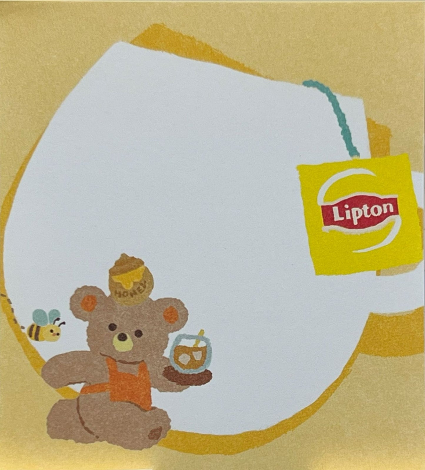 ハニーティーを楽しむくまのメモパッド（リプトン紅茶、はちみつ、ミツバチのイラスト）
Memo pad featuring a bear enjoying honey tea with Lipton tea, honey pot, and bees